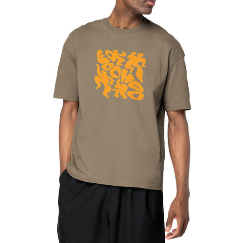 Man wearing a brown t-shirt with orange graphic design on a white background