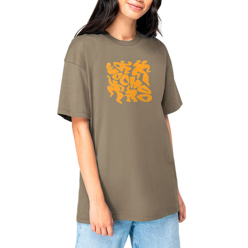 Woman wearing a brown t-shirt with orange graphic design on a white background